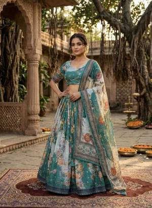 Looking These Party Wear Lehenga Choli in Fine Colored. These Lehenga And Blouse Are Tabby Silk And Dupatta Are Fabricated On Tabby Silk Fabriced. It is Beautified With Digital Printed Designer,Embroidery Work.
