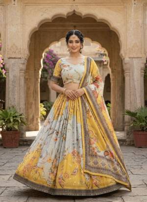 Looking These Party Wear Lehenga Choli in Fine Colored. These Lehenga And Blouse Are Tabby Silk And Dupatta Are Fabricated On Tabby Silk Fabriced. It is Beautified With Digital Printed Designer,Embroidery Work.