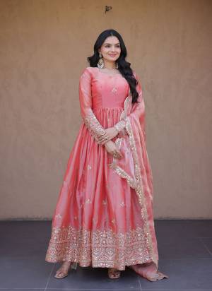 Attactive These Beautiful Looking Readymade Long Gown With Dupatta.These Gown And Dupatta Are Fendy Silk Fabricated.Its Beautified With Designer Sequance,Jari Embroidery Work.