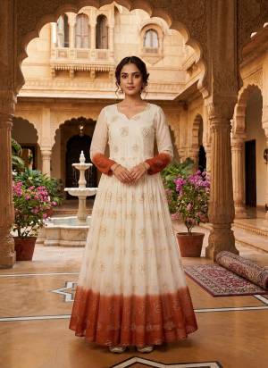Garb These Beautiful Looking Readymade Long Gown.These Gown Are Silver Crunchy Fabricated.Its Beautified With Sheded Color With Designer Pipe Sequance Embroidery Work.