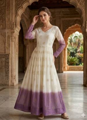 Garb These Beautiful Looking Readymade Long Gown.These Gown Are Silver Crunchy Fabricated.Its Beautified With Sheded Color With Designer Pipe Sequance Embroidery Work.