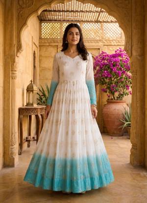 Garb These Beautiful Looking Readymade Long Gown.These Gown Are Silver Crunchy Fabricated.Its Beautified With Sheded Color With Designer Pipe Sequance Embroidery Work.