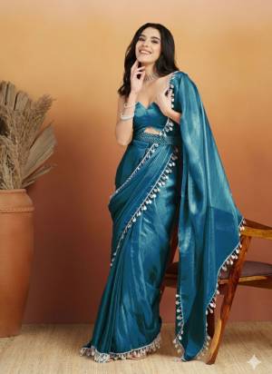 Garb These Party Wear Ready To Wear Saree in Fine Colored.These Saree Are Organza And Blouse is Organza Fabricated.Its Beautified With Solid With Heavy Lace Border Designer.