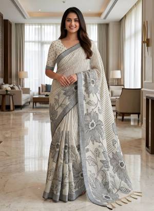 Looking These Party Wear Saree in Fine Colored.These Saree Are Linen And Blouse is Fabricated On Linen.Its Beautified With Woven Border Designer With Floral Printed.
