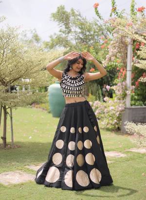 Looking These Beautiful Looking Navratri Wear Free Size Stitched Lahenga Choli.These Lahenga Are Roman Silk And Blouse is Fabricated On Roman Silk.Its Beautified With Designer Mirror Lace And Round Gota Work.