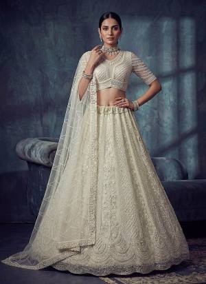 For A Fancy Designer Look,Grab These Lehenga Choli With Dupatta in Fine Colored.These Lehenga And Choli Are Net And Dupatta Are Fabricated On Soft Net Pair.Its Beautified With Fancy Patten,Jari,Sequance,Kasab,Thread Embroidery,Motif Work. 