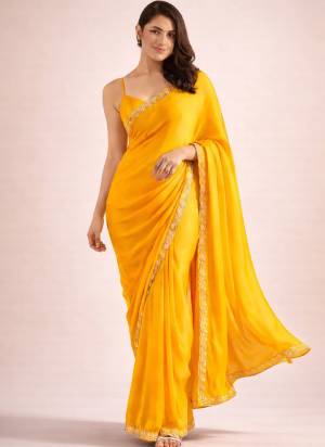 Grab These Party Wear Ready To Wear Saree in Fine Colored Pair With Blouse.These Saree and Blouse Are Fabricated On Satin Chiffon.Its Beautified With Solid With Lace Border Designer.