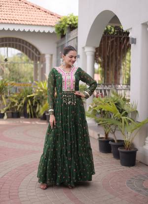 Garb These Beautiful Looking Navratri Readymade Long Gown.These Gown Are Faux Georgette Fabricated.Its Beautified With Laheriya Printed With Kutchi Patch Work.