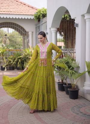 Garb These Beautiful Looking Navratri Readymade Long Gown.These Gown Are Faux Georgette Fabricated.Its Beautified With Laheriya Printed With Kutchi Patch Work.