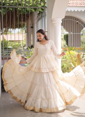 Looking These Beautiful Looking Navratri Wear Free Size Stitched Lahenga Choli.These Lahenga Are Cora Cotton And Blouse is Fabricated On Cora Cotton.Its Beautified With Designer Gota Patti Lace Work.