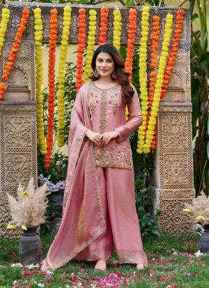 Garb These Suit in Fine Colored Pair With Bottom And Dupatta.These Top Are Fendy Satin And Bottom Are Fabricated On Fendy Satin Pair With Fendy Satin Dupatta.Its Beautified With Designer Beads Embroidery Work.