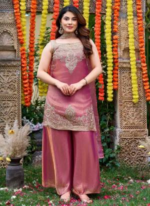 Garb These Suit in Fine Colored Pair With Bottom And Dupatta.These Top Are Fendy Satin And Bottom Are Fabricated On Fendy Satin Pair With Fendy Satin Dupatta.Its Beautified With Designer Embroidery Work.