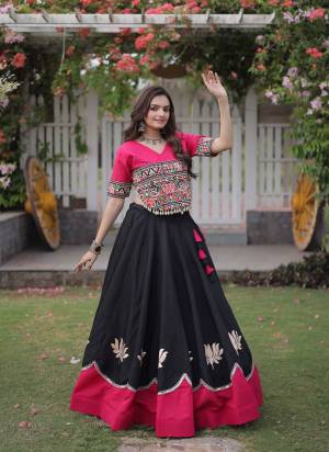Looking These Beautiful Looking Navratri Wear Free Size Stitched Lahenga Top.These Lahenga Are Roman And Blouse Top is Fabricated On Roman.Its Beautified With Designer Kutchi Gamti Embroidery,Gota Lotus Flower, Mirror Lace Work.
