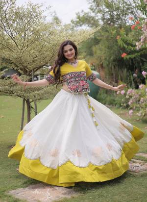 Looking These Beautiful Looking Navratri Wear Free Size Stitched Lahenga Top.These Lahenga Are Roman And Blouse Top is Fabricated On Roman.Its Beautified With Designer Kutchi Gamti Embroidery,Gota Lotus Flower, Mirror Lace Work.