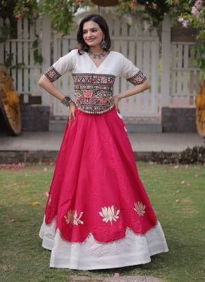 Looking These Beautiful Looking Navratri Wear Free Size Stitched Lahenga Top.These Lahenga Are Roman And Blouse Top is Fabricated On Roman.Its Beautified With Designer Kutchi Gamti Embroidery,Gota Lotus Flower, Mirror Lace Work.