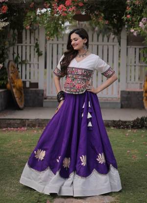 Looking These Beautiful Looking Navratri Wear Free Size Stitched Lahenga Top.These Lahenga Are Roman And Blouse Top is Fabricated On Roman.Its Beautified With Designer Kutchi Gamti Embroidery,Gota Lotus Flower, Mirror Lace Work.