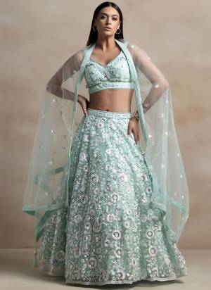 For A Designer Look,Grab These Lehenga Choli in Fine Colored.These Lehenga And Blouse Are Fabricated On Soft Net Pair With Dupatta Are Soft Net.Its Beautified With Thread,Multiple Sequance Embroidery Work.