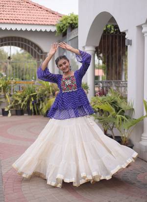 Looking These Navratri Wear Lehenga Choli in Fine Colored. These Lehenga Are Kora Cotton And Blouse Are Faux Georgette Fabricated. It is Beautified With Designer Lahariya Printed With Kutchi Gamthi Patch Work.