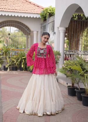 Looking These Navratri Wear Lehenga Choli in Fine Colored. These Lehenga Are Kora Cotton And Blouse Are Faux Georgette Fabricated. It is Beautified With Designer Lahariya Printed With Kutchi Gamthi Patch Work.