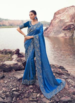 Looking These Fancy Party And Fastival Wear Saree in Fine Colored.These Saree Are Satin Jacquard And Blouse is Fabricated On Silk.Its Beautified With Designer Mirror,Jari,Sequance Embroidery With Pearl Stone Hand Work.