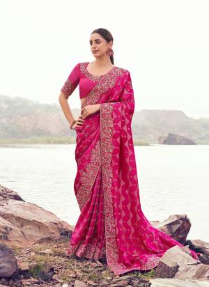Looking These Fancy Party And Fastival Wear Saree in Fine Colored.These Saree Are Satin Jacquard And Blouse is Fabricated On Silk.Its Beautified With Designer Mirror,Jari,Sequance Embroidery With Pearl Stone Hand Work.