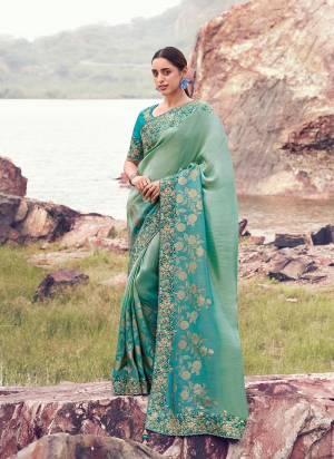 Looking These Fancy Party And Fastival Wear Saree in Fine Colored.These Saree Are Bhagalpuri Tissue And Blouse is Fabricated On Silk.Its Beautified With Designer Mirror,Jari,Sequance Embroidery With Pearl Stone Hand Work.