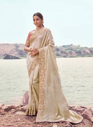 Looking These Fancy Party And Fastival Wear Saree in Fine Colored.These Saree Are Satin Silk And Blouse is Fabricated On Silk.Its Beautified With Designer Mirror,Jari,Sequance Embroidery With Pearl Stone Hand Work.