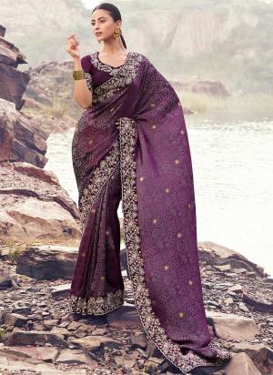 Looking These Fancy Party And Fastival Wear Saree in Fine Colored.These Saree Are Satin Jacquard And Blouse is Fabricated On Silk.Its Beautified With Designer Mirror,Jari,Sequance Embroidery With Pearl Stone Hand Work.