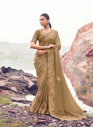 Looking These Fancy Party And Fastival Wear Saree in Fine Colored.These Saree Are Banarasi Silk And Blouse is Fabricated On Silk.Its Beautified With Designer Mirror,Jari,Sequance Embroidery With Pearl Stone Hand Work.