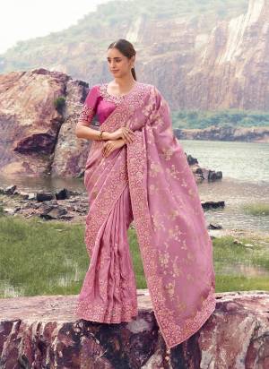 Looking These Fancy Party And Fastival Wear Saree in Fine Colored.These Saree Are Tissue Jacquard And Blouse is Fabricated On Silk.Its Beautified With Designer Mirror,Jari,Sequance Embroidery With Pearl Stone Hand Work.
