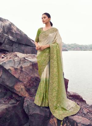 Looking These Fancy Party And Fastival Wear Saree in Fine Colored.These Saree Are Tissue Jacquard And Blouse is Fabricated On Silk.Its Beautified With Designer Mirror,Jari,Sequance Embroidery With Pearl Stone Hand Work.