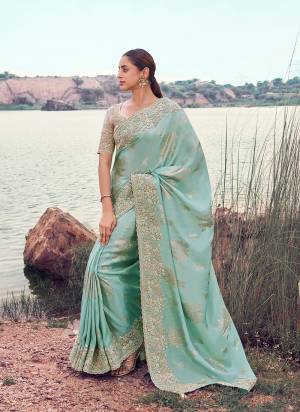 Looking These Fancy Party And Fastival Wear Saree in Fine Colored.These Saree Are Tissue Jacquard And Blouse is Fabricated On Silk.Its Beautified With Designer Mirror,Jari,Sequance Embroidery With Pearl Stone Hand Work.