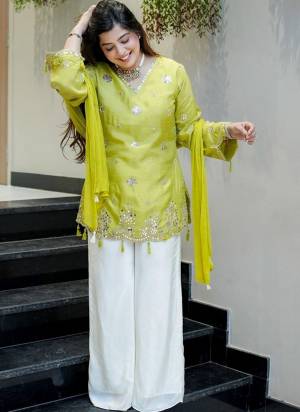Garb These Suit in Fine Colored Pair With Bottom And Dupatta.These Top Are Silk And Bottom Are Fabricated On Silk Pair With Naznin Dupatta.Its Beautified With Designer Embroidery Work.