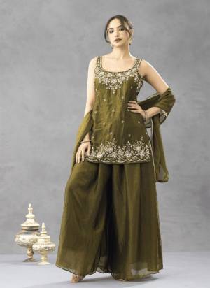 Garb These Suit in Fine Colored Pair With Bottom And Dupatta.These Top Are Chartin And Bottom Are Fabricated On Chartin Pair With Chartin Dupatta.Its Beautified With Designer Embroidery Work.