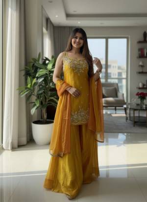 Garb These Suit in Fine Colored Pair With Bottom And Dupatta.These Top Are Chartin And Bottom Are Fabricated On Chartin Pair With Chartin Dupatta.Its Beautified With Designer Embroidery Work.