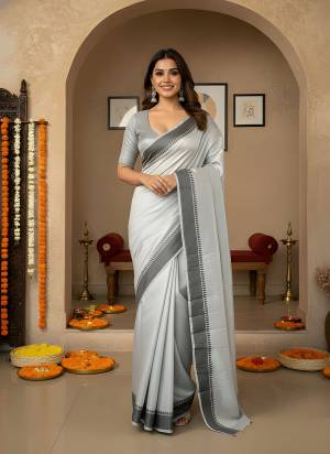 Garb These Party Wear Saree in Fine Colored.These Saree is Fabricated On Manipuri Kalam Pair With Manipuri Kalam Blouse.Its Beautified Woven Border Designer.