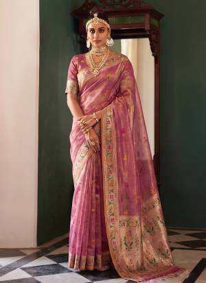 Garb These Fastive And Party Wear Saree in Fine Colored.These Saree And Blouse is Fabricated On Tissue Silk.Its Beautified With Woven Jacquard Designer.
