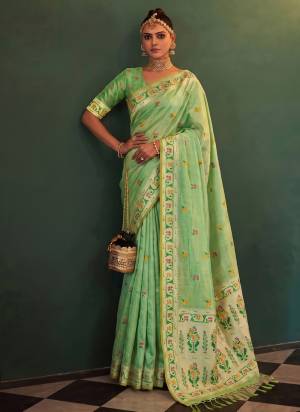 Garb These Fastive And Party Wear Saree in Fine Colored.These Saree And Blouse is Fabricated On Tissue Silk.Its Beautified With Woven Jacquard Designer.