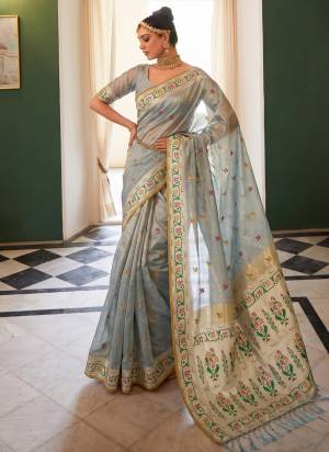 Garb These Fastive And Party Wear Saree in Fine Colored.These Saree And Blouse is Fabricated On Tissue Silk.Its Beautified With Woven Jacquard Designer.