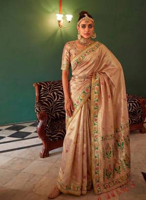 Garb These Fastive And Party Wear Saree in Fine Colored.These Saree And Blouse is Fabricated On Tissue Silk.Its Beautified With Woven Jacquard Designer.