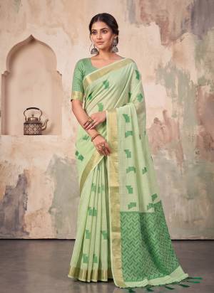 Garb These Fastive And Party Wear Saree in Fine Colored.These Saree And Blouse is Fabricated On Linen.Its Beautified With Woven Jari Border With Resham Designer.