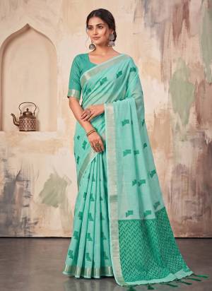 Garb These Fastive And Party Wear Saree in Fine Colored.These Saree And Blouse is Fabricated On Linen.Its Beautified With Woven Jari Border With Resham Designer.