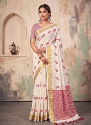 Garb These Fastive And Party Wear Saree in Fine Colored.These Saree And Blouse is Fabricated On Linen.Its Beautified With Woven Jari Border With Resham Designer.