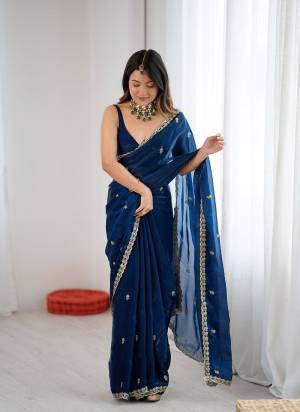 Attractive These Fancy Party Wear Saree in Fine Two Tone Colored.These Saree Are Fendy Satin And Blouse is Fendy Satin Fabricated.Its Beautified With Two Tone Color,Designer Jari,Sequance Embroidery Work.