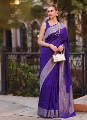 Garb These Fastive And Party Wear Saree in Fine Colored.These Saree And Blouse is Fabricated On Cotton Blend.Its Beautified With Woven Designer.