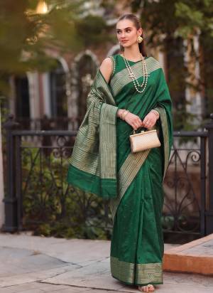 Garb These Fastive And Party Wear Saree in Fine Colored.These Saree And Blouse is Fabricated On Cotton Blend.Its Beautified With Woven Designer.