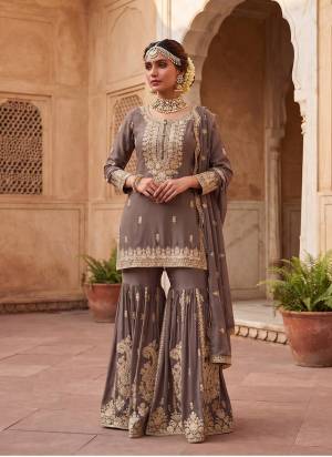 Garb These Party Wear Free Size Stitched Sharara Suit in Fine Colored Pair With Dupatta.These Top And Dupatta Are Chinon And Bottom Are Chinon.Its Beautified With Designer Embroidery,Hand Work.