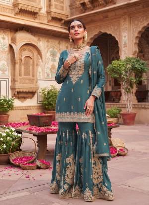 Garb These Party Wear Free Size Stitched Sharara Suit in Fine Colored Pair With Dupatta.These Top And Dupatta Are Chinon And Bottom Are Chinon.Its Beautified With Designer Embroidery,Hand Work.