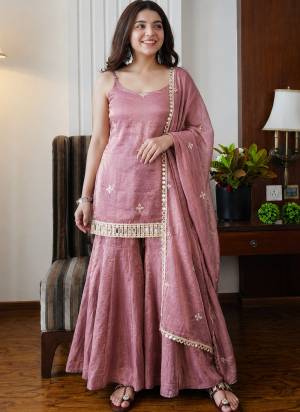 Looking These Suit in Fine Colored Pair With Bottom And Dupatta.These Top Are Fendy Silk And Bottom Are Fabricated On Fendy Silk Pair With Fendy Silk Dupatta.Its Beautified With Designer Embroidery Work.