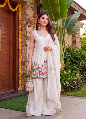 Looking These Suit in Fine Colored Pair With Bottom And Dupatta.These Top Are French Crepe And Bottom Are Fabricated On French Crepe Pair With Chinon Dupatta.Its Beautified With Designer Embroidery Work.